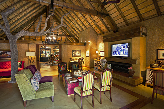Camp Jabulani Main Lodge tv Lounge Fire place Greater Kruger